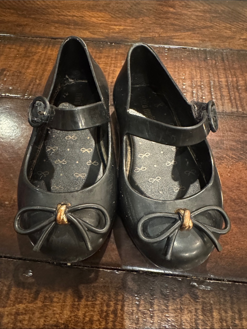Mini Melissa Black Mary Jane Flats with Gold Knot